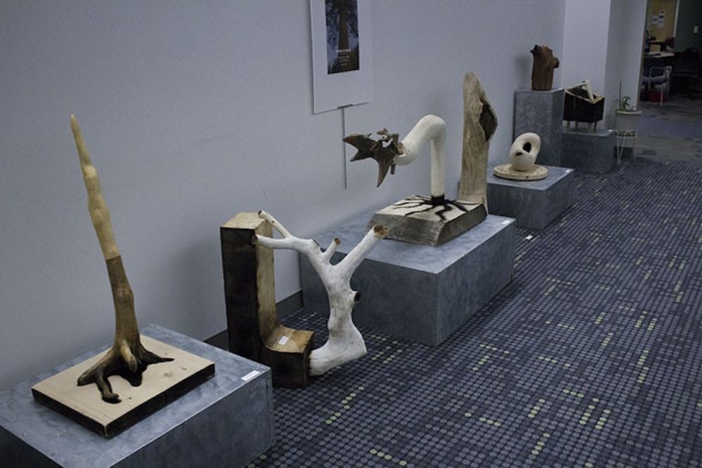 SU students display wooden sculptures in Lehman Library
