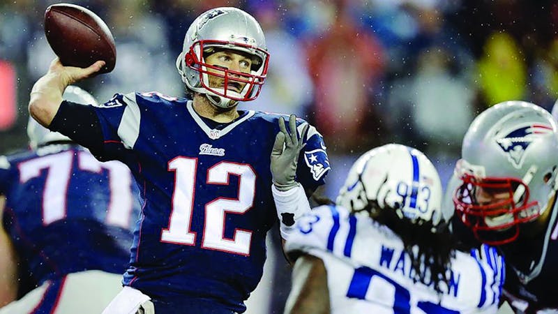 Tom Brady throws a pass in the AFC Championship game against the Indianapolis Colts.