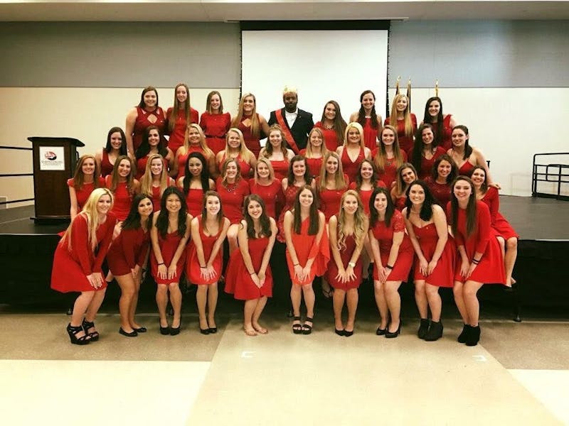 The sisters of Alpha Phi join the 2016 Mr. Ivy pageant winner, senior and brother of Tau Kappa Epsilon Kenny Miles. Miles won the crowd over with a poem he wrote for the talent portion of the pageant about each of the SU sororities.