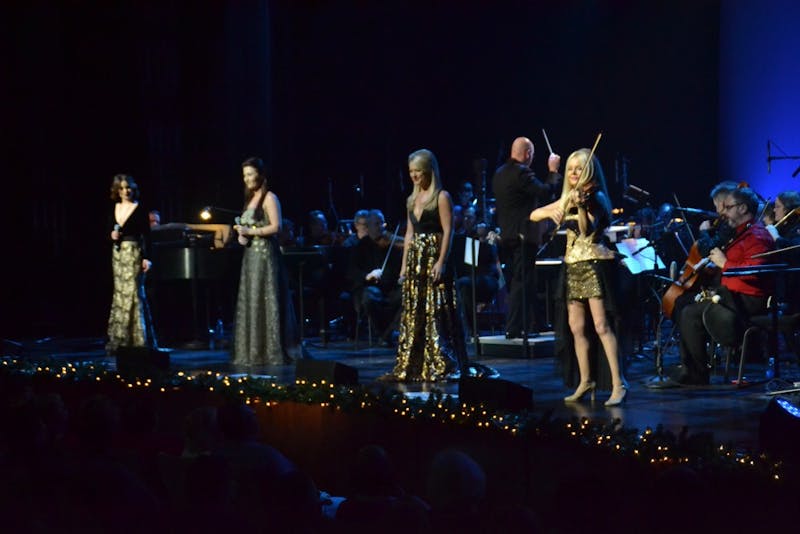 All four members of Celtic Woman stand in their respective lights and deliver the first of many classic Christmas tunes.