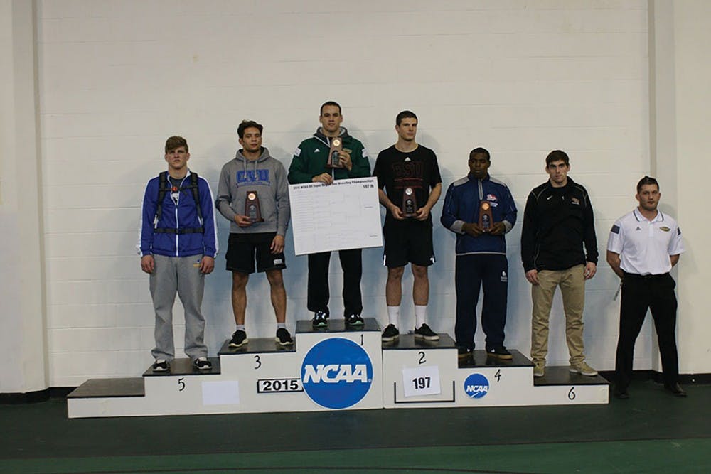 Wrestling team sends four to national championship after successful weekend