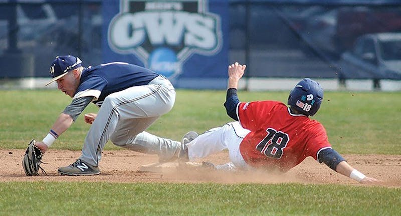 SU’s Tommy Baggett, right, slides safely into second during the Raiders’ 12–11 comeback win on Tuesday.&nbsp;