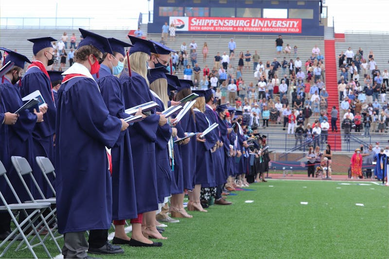 To conclude the traditional ceremony, graduates and attendees sang the SU Alma Mater song.&nbsp;