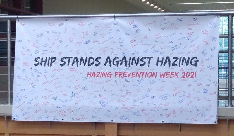 The signed Pledge Against Hazing banner hangs in the CUB’s main hall following the university’s annual Hazing Prevention Week.