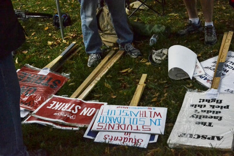 Union members cast aside their picket signs after getting word the strike was over. APSCUF and PASSHE mediated the tentative contract via Gov. Tom Wolf’s office on Friday.