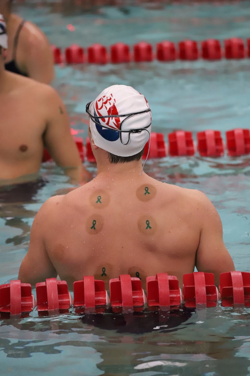 Shippensburg University´s swim team featured the student-athlete group "The Hidden Opponent" during their home meet on Friday, Oct. 20. The group is represented by the green ribbon stickers on the athlete´s back.