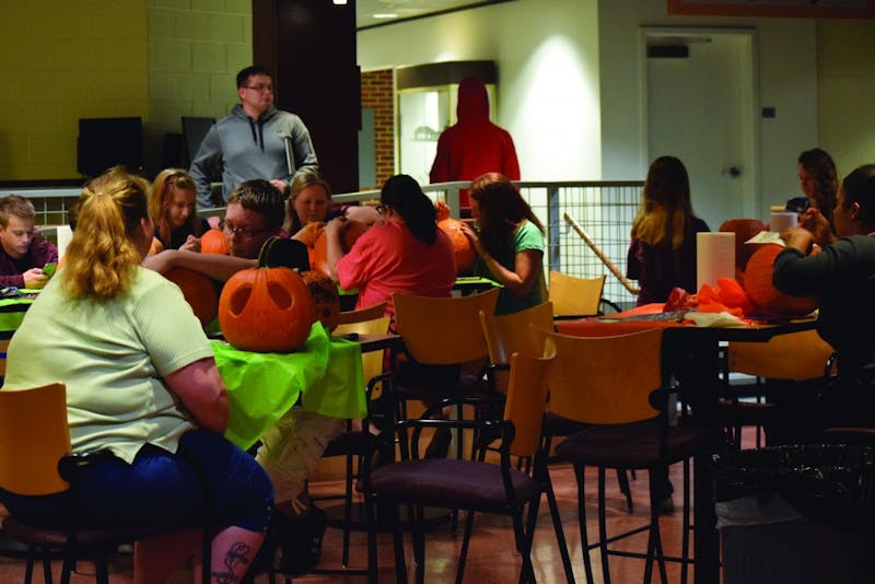 Students gathered in McFeely’s Coffeehouse to finish off October with pumpkin carving on the night before Halloween.