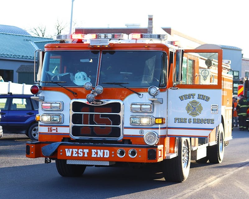 One of the three West End Fire and Rescue trucks parks in the lot between the Grace B. Luhrs University Elementary School and the Franklin Science Center.&nbsp;