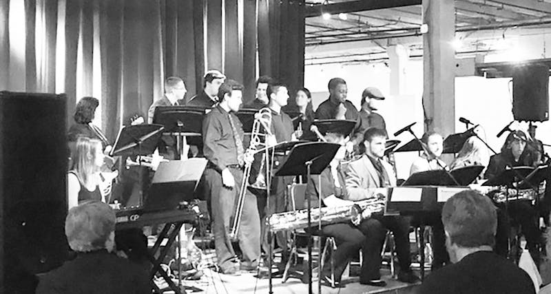 The Shippensburg University Jazz Band and its graduating seniors perform before a community crowd at The Thought Lot.