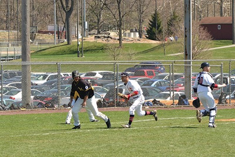 Betz and Kennedy trap a runner for an out. Each homered in Game 2; Kennedy now has 16 on the year.