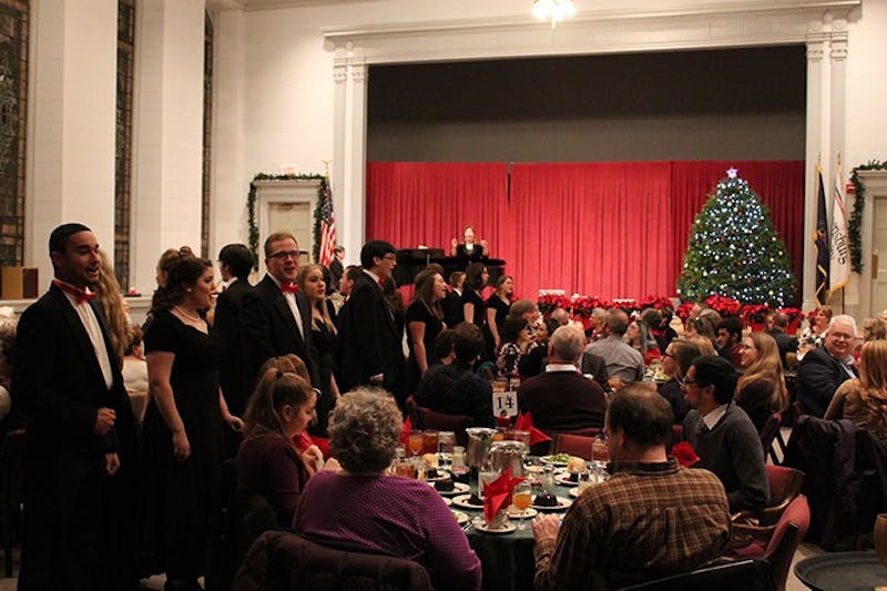 The SU Madrigal Singers give their audience a musical performance with their dinner. Each year the singers perform their Christmas concert in Old Main Chapel.