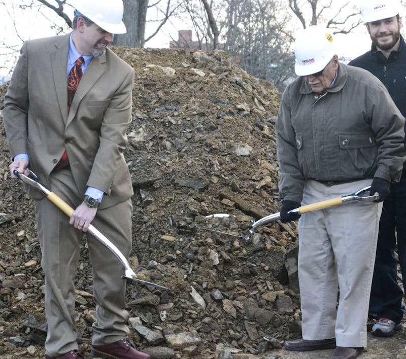 Members of the Shippensburg community break ground for the library expansion.
