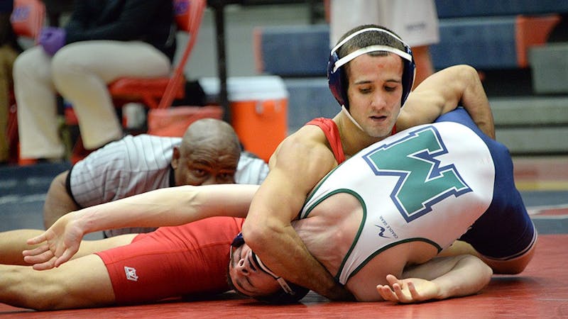 SU’s 133-pound Mike Hafer collects key near fall points against Mercyhurst’s Gage Nicolella.
