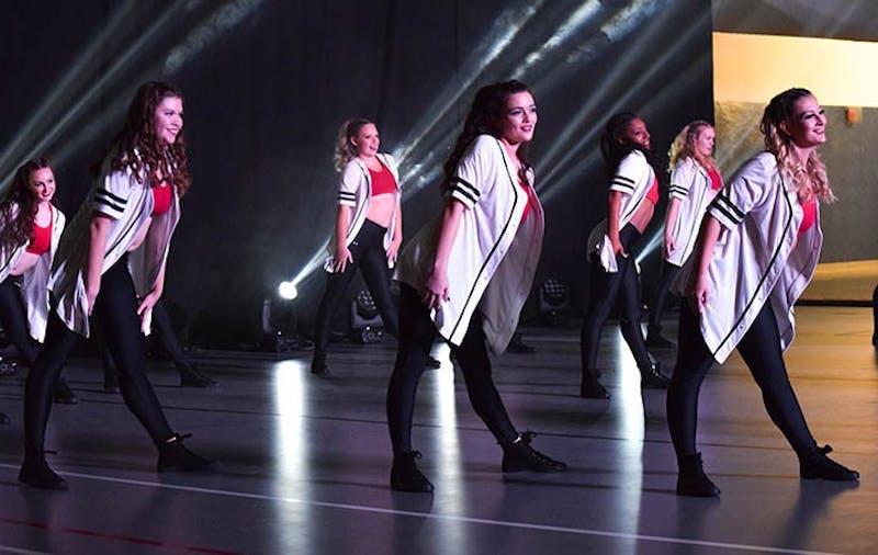 SU’s In-Motion Dance Troupe performs their routine during the spirit rally on Friday.