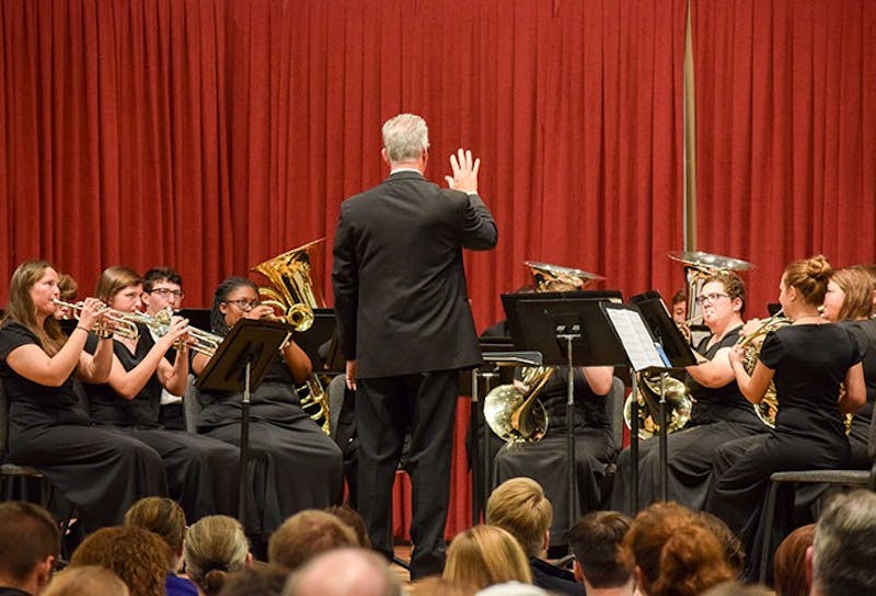 Trever Famulare, SU director of bands, leads the SU Brass Ensemble in its musical journey through legato pieces such as “Salute to the USA” and others that were less familiar to the audience’s ear, including “Wedding of Kije.”