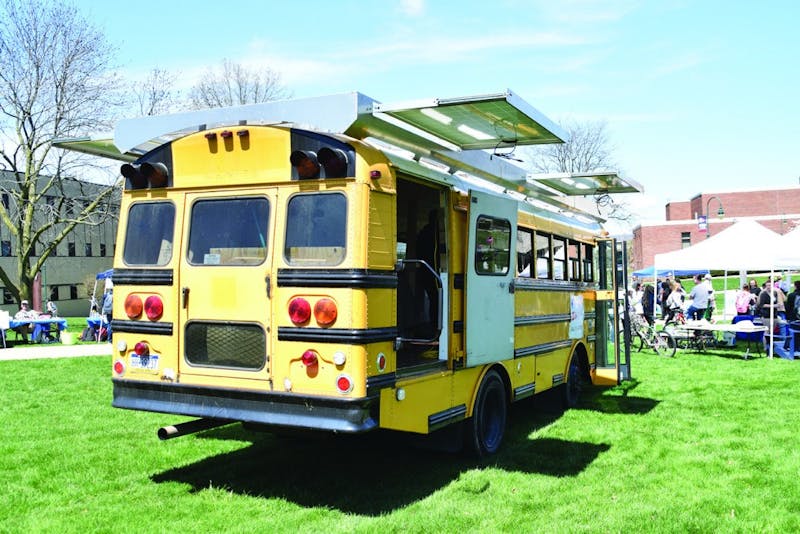 Dustin McCorkle and his partner have worked on the sustainable bus for the last year and a half. The two plan to live in the bus once it is finished.