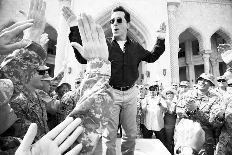 Stephen Colbert greets troops and civilians at Al Faw Palace at Camp Victory in Baghdad, Iraq, on June 5 as part of his "Operation Iraqi Stephen: Going Command" tour.