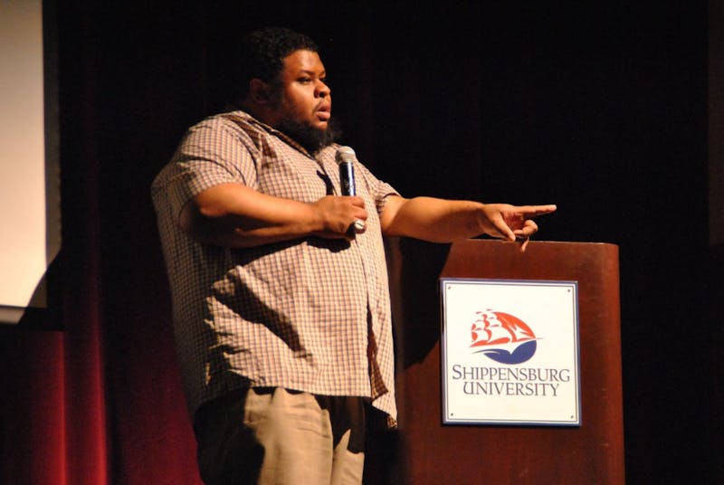 Twitty talks to students in Memorial Auditorium about how history can inspire food.