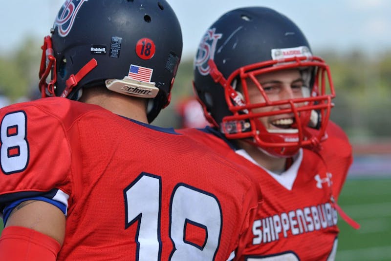 	Mike Frenette celebrates his touchdown in the third quarter with Zach Zulli. 