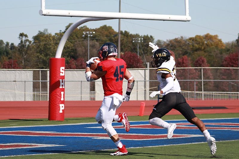 Luke Durkin runs into the end zone for one of his two touchdowns against Millersville. He rushed for 213 yards and had two touchdowns on 31 carries. The yardage was the most by a Red Raider running back since John Kuhn’s 234 yards against Millersville 15 years ago.