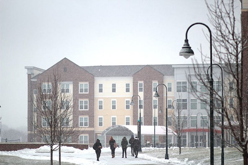 Shippensburg University students trek through the quad, despite winter weather.