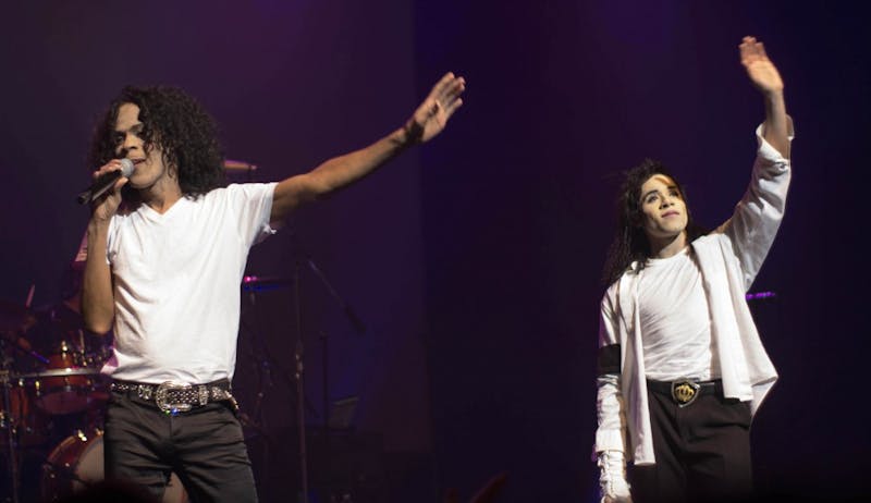 Joseph Bell (left) and James Times III (right) pay tribute to the late Michael Jackson on Friday.