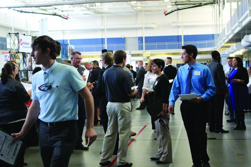 Students explore the Career Fair for employment opportunities.