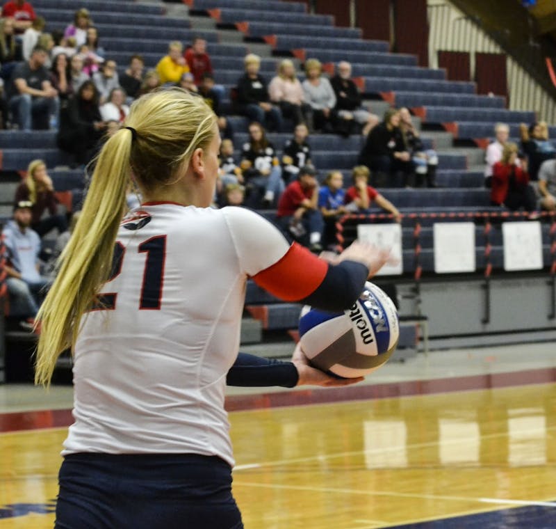 Maura Nolan serves in a weekend volleyball match at Heiges Field House.