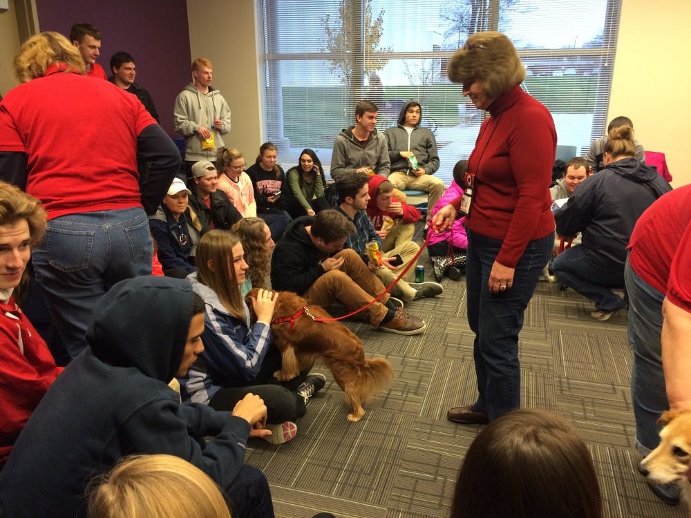 Students invited to de-stress with puppies