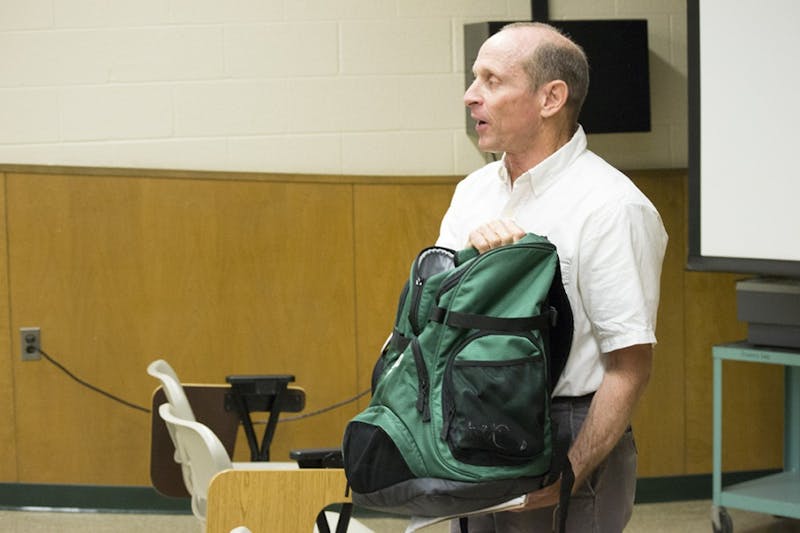 David Radcliff, director of the New Community Project, shares how to strategically take a pizza box out of the trash to cut down on food waste. Radcliff is an active environmentalist.(