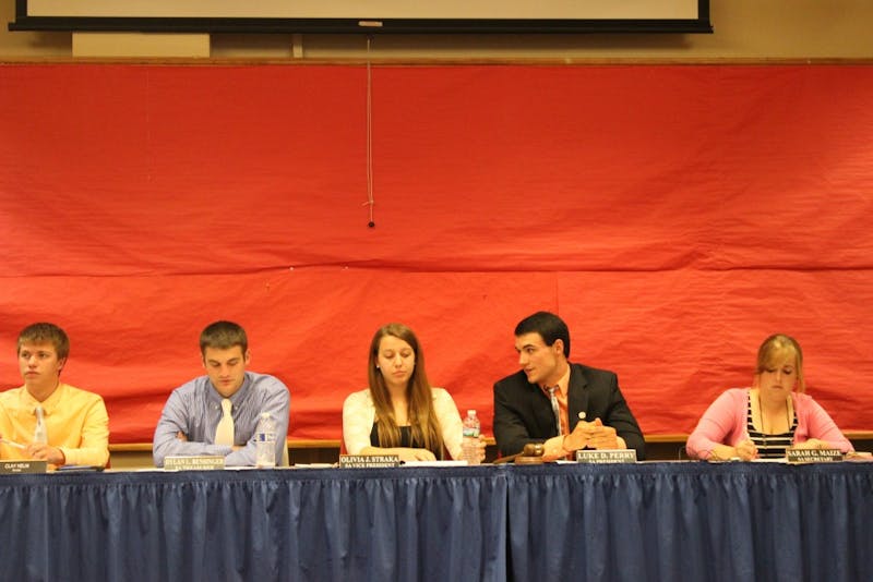 	(Left to right) Clay Helm, Dylan L. Bensinger, Olivia J. Straka, Luke D. Perry and Sarah G. Maize finsih the latest Student Senate meeting held Thursday, Sept. 19.