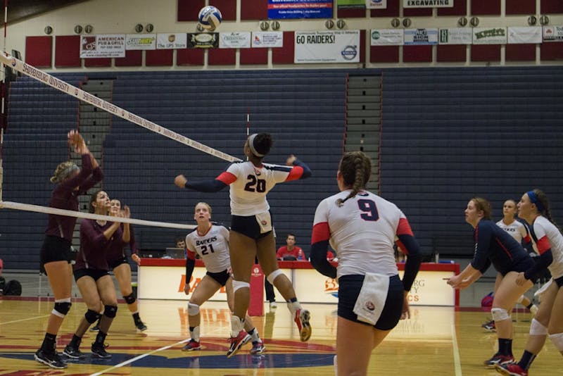 Kendall Johnson goes up for a kill against Concord University.