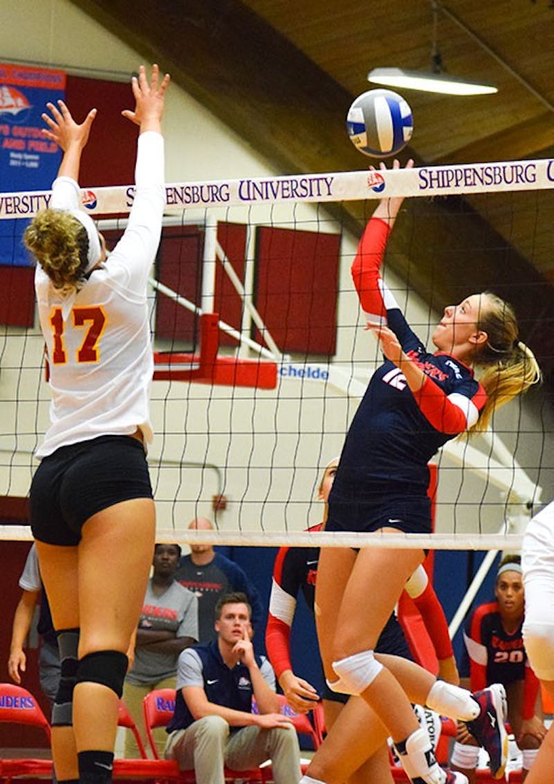 Shippensburg’s Samantha Webber goes up for a kill against Gannon University on Friday night at Heiges Field House. Despite dropping the first two sets, the Raiders rallied back to edge the defending conference champs in five sets.