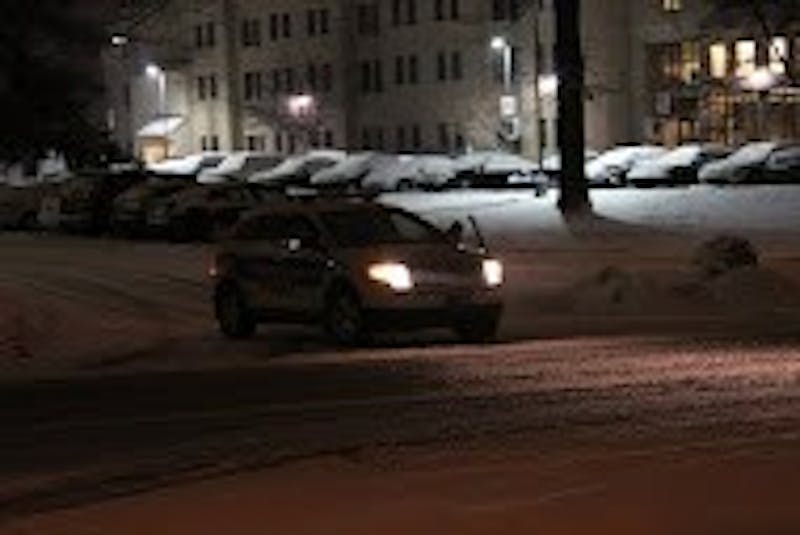 An SU police vehicle leaves College Park Commons after investigating the area for criminal activity.