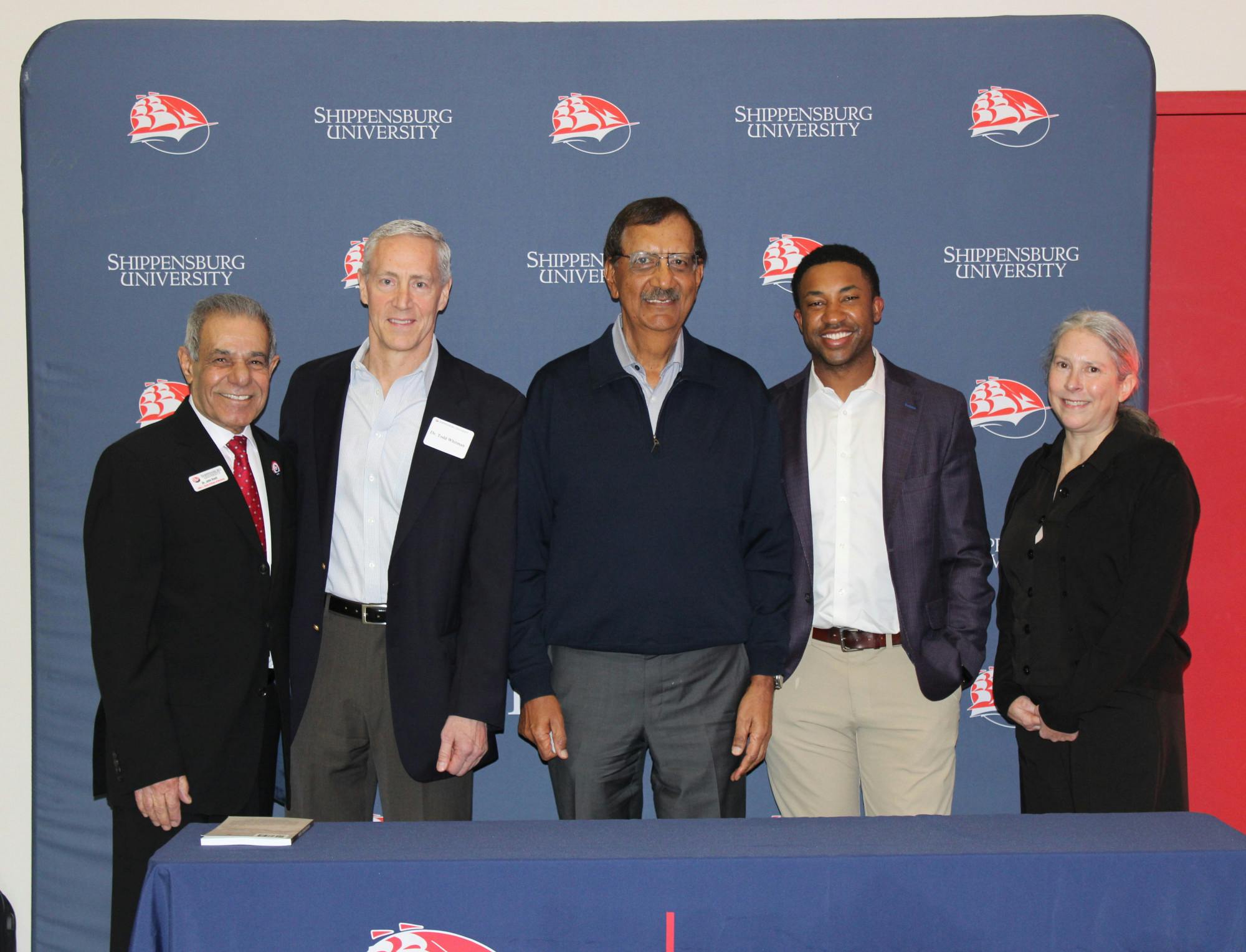 Shippensburg University faculty joined Jay Sidhu (center) and Sherrod Davis (center-right) in advocating for student entrepreneurs.
