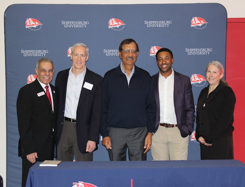 Shippensburg University faculty joined Jay Sidhu (center) and Sherrod Davis (center-right) in advocating for student entrepreneurs.