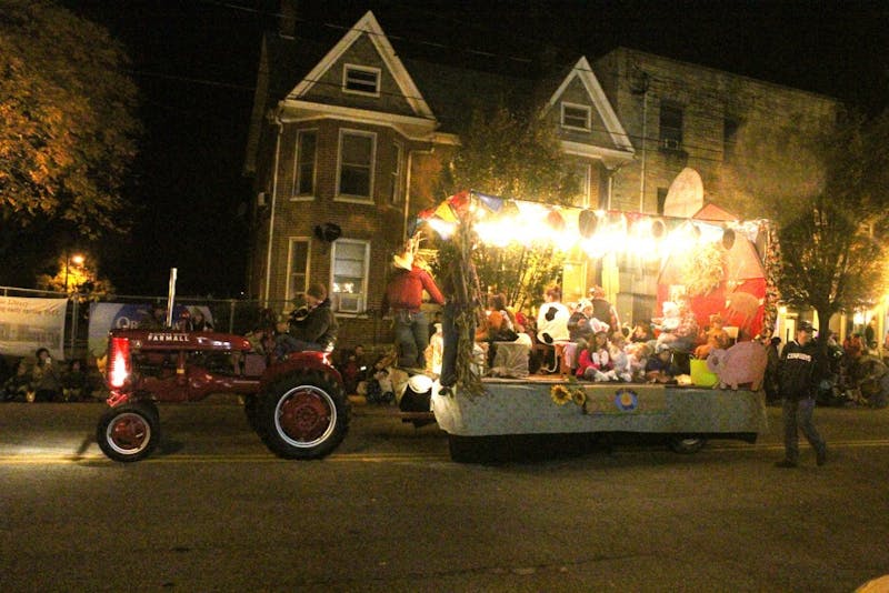 Parade floats drive through downtown Shippensburg during the town’s annual Halloween parade. Members of the community gathered along both sides of King Street to watch the display.