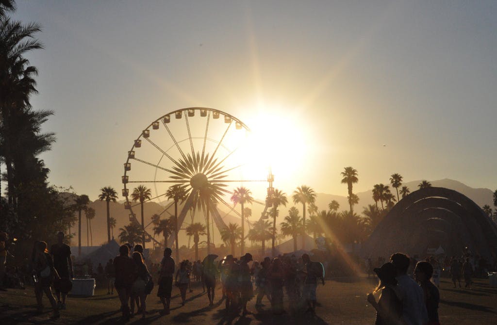The sun sets over the Coachella Valley Music and Arts Festival on April 21, 2012, during the 2nd day of the festival's 2nd weekend. | Jason Persse, Wikimedia Commons
