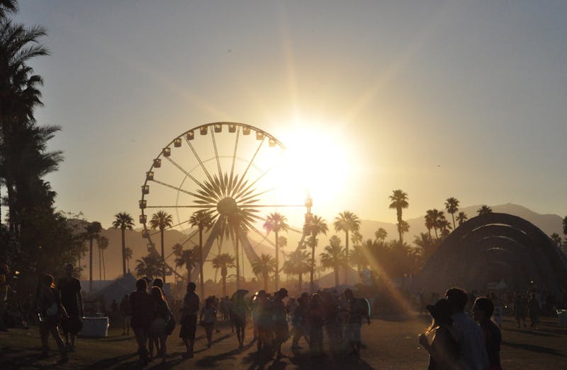 The sun sets over the Coachella Valley Music and Arts Festival on April 21, 2012, during the 2nd day of the festival's 2nd weekend. | Jason Persse, Wikimedia Commons