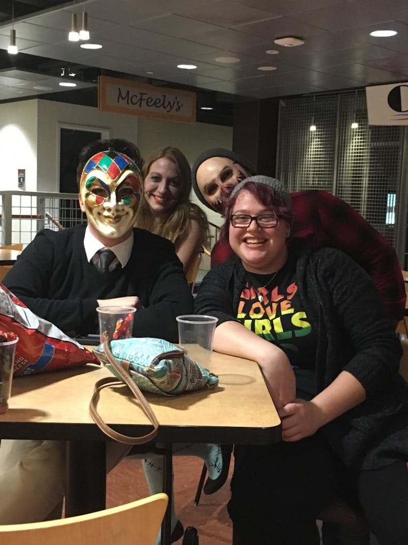 Scream Slam attendees enjoy some Halloween themed poetry and costumes at McFeely’s.