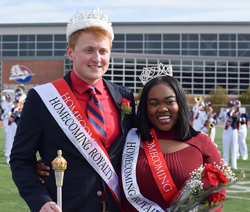 Cody Olson and Karla Moses smile for pictures together after being crowned king and queen. Olson raised more than $2,000, and Moses raised $1,800.