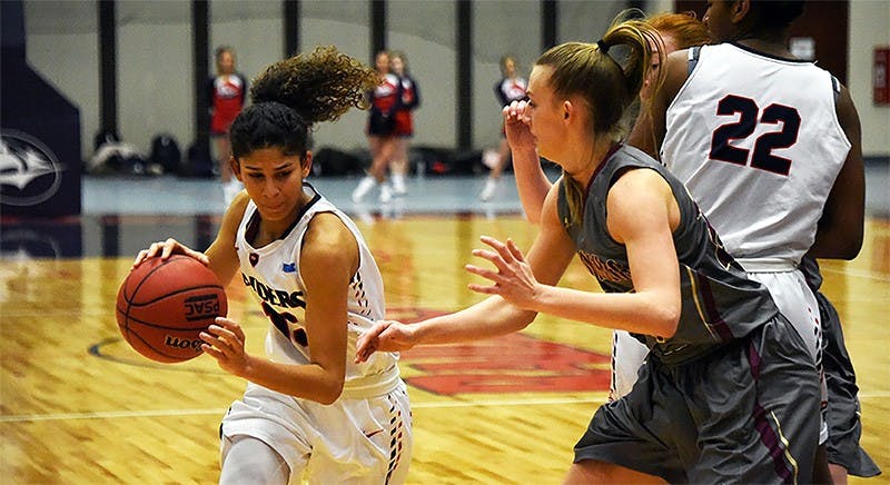 Ariel Jones (left) scores a career-high 38 points in the team’s 78-71 loss to Bloomsburg Wednesday night.&nbsp;