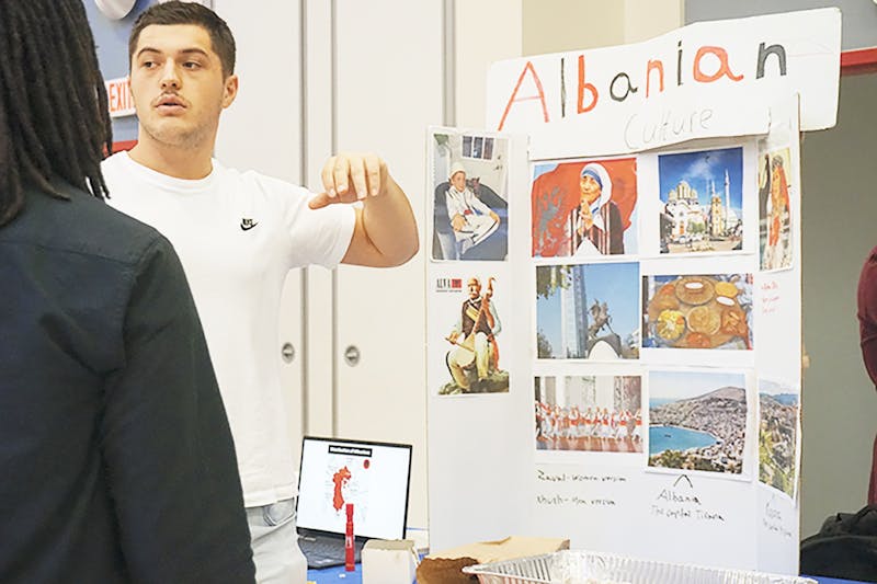 SU student demonstrates his culture to participants of All Around the World.&nbsp;