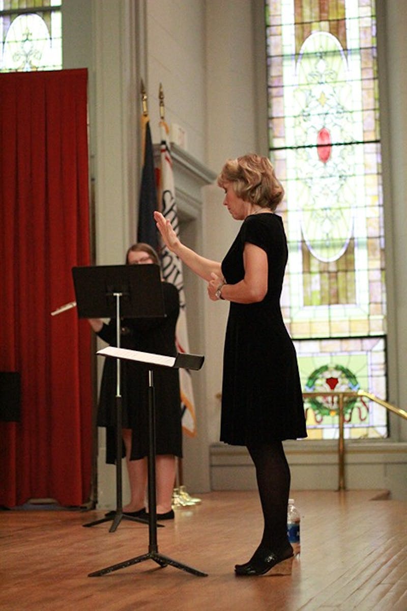 Suzanne Thierry, director of the SU Flute Choir, leads her student musicians through a variety of sounding music from countries around the world including America, Russia, Argentina, England and Germany.