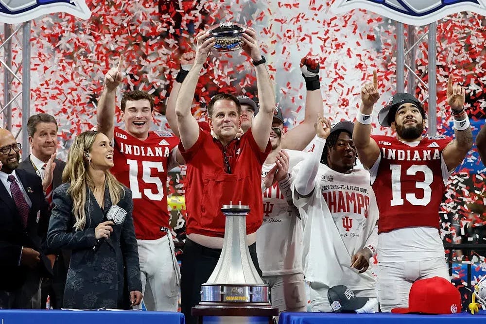 <p>Indiana University lifts the 2026 College Football Playoffs National Championship trophy.</p><p>Photo courtesy of The Daily Hoosier.</p>
