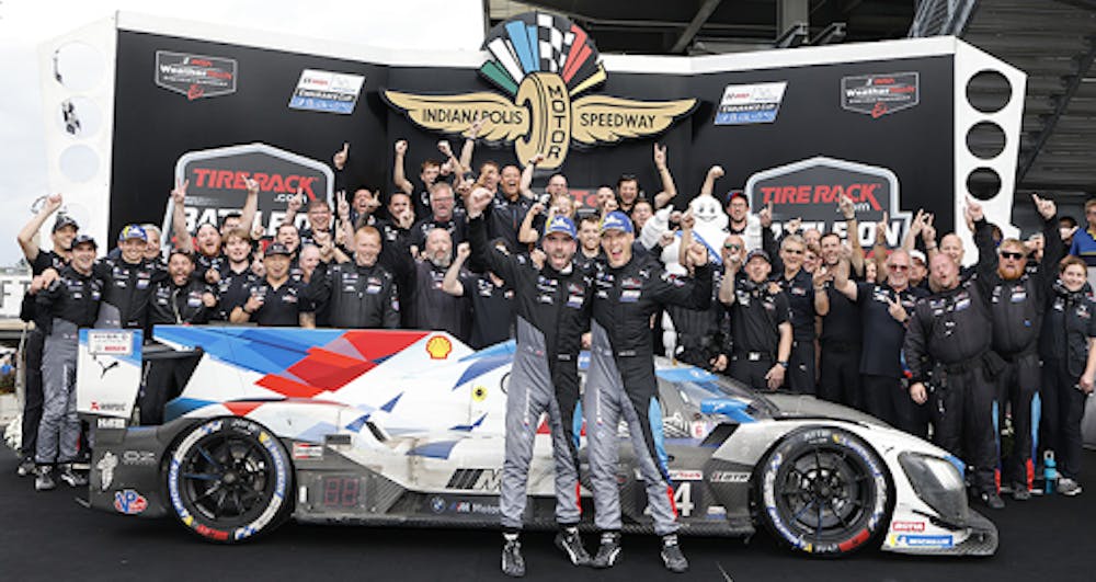 Philipp Eng (center left) and Jesse Krohn (center right) celebrate with BMW M Team RLL.
Courtesy of IMSA.com