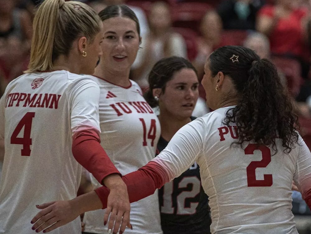 <p>IU Indy&#x27;s Jillian Tippmann (4), Bailey Sinish (14), Laura Roeder (12) and Grace Purichia (2) regroup between points during the Jaguars&#x27; 3-1 loss to Marshall on Sept. 4, 2026, at the IU Indy Gymnasium. (Photo courtesy of IU Indy Athletics)</p>