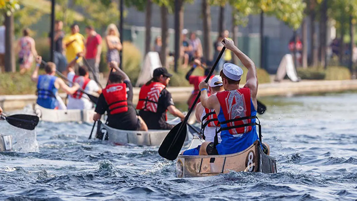 Regatta participants canoe on the canal at Military Park
