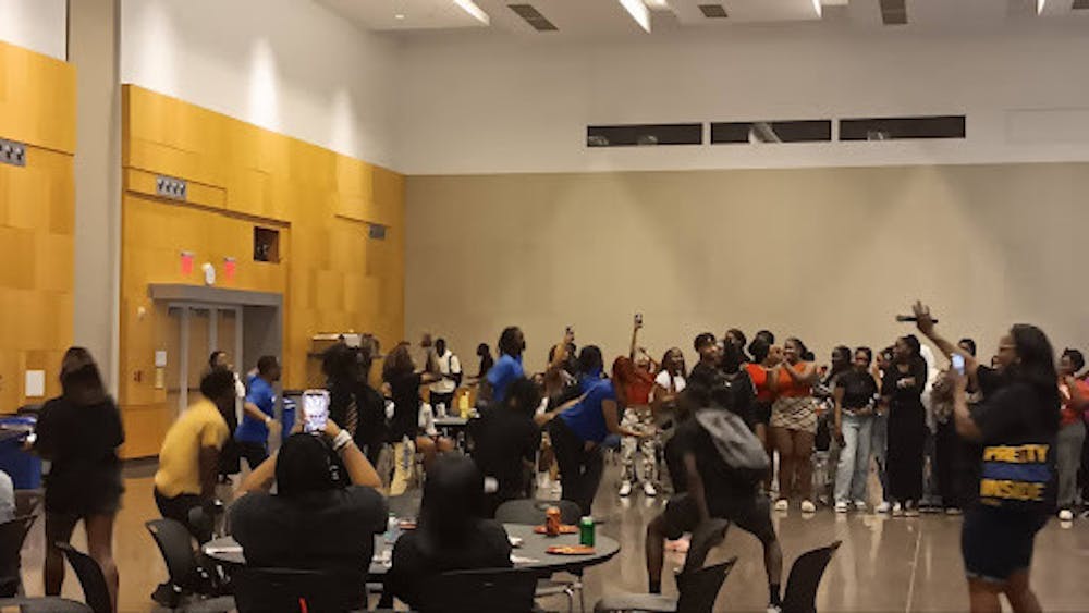 Black Student Union members dance during The Kickback: Black Student Welcome Back at the IUI Campus Center on Sept. 5.