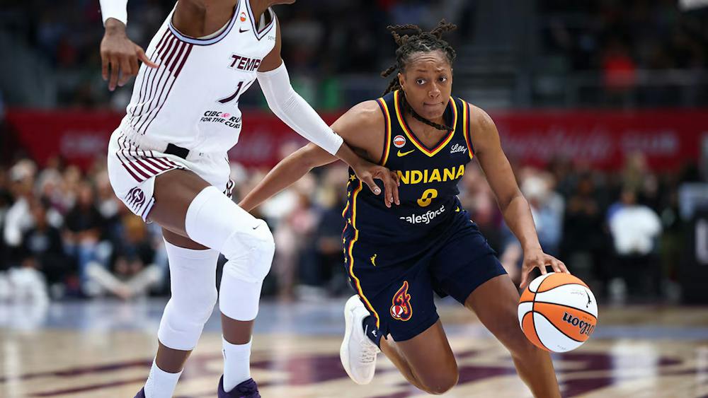 Fever guard Kelsey Mitchell dribbles the ball against the Toronto Tempo on Sept. 18, 2026, at Coca-Cola Coliseum in Toronto. (Photo courtesy of the Indiana Fever)